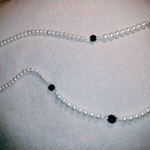 Monet: faux pearl and black beaded necklace.